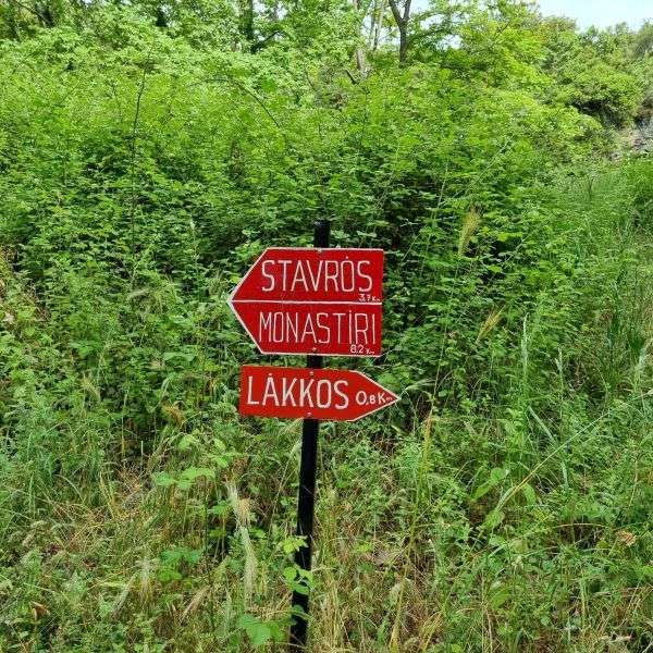 A trail sign showing the hiking route from Litochoro to Stavros Refuge, Mount Olympus